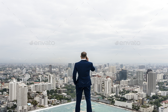 Business Man Talking On A Phone With A Cityscape Background Stock Photo By Rawpixel