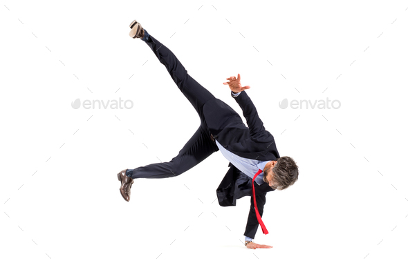 Stylish businessman in suit doing hip-hop dancing - Stock Photo - Images