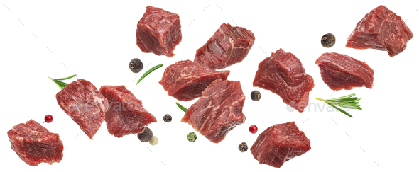 Cubes of raw beef isolated on white background