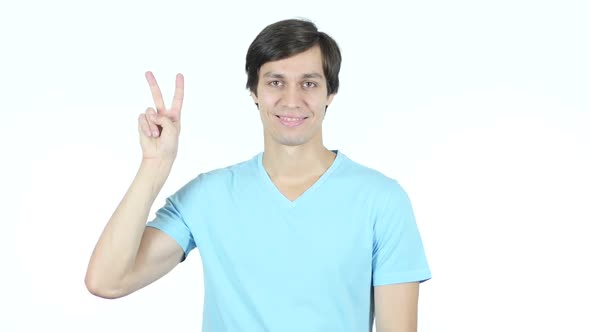 Victory Sign by Young Casual Man, White Background alt