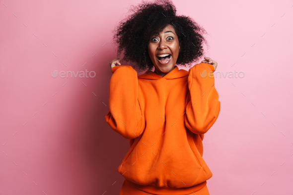 Excited African American Woman Screaming And Gesturing On Camera Stock