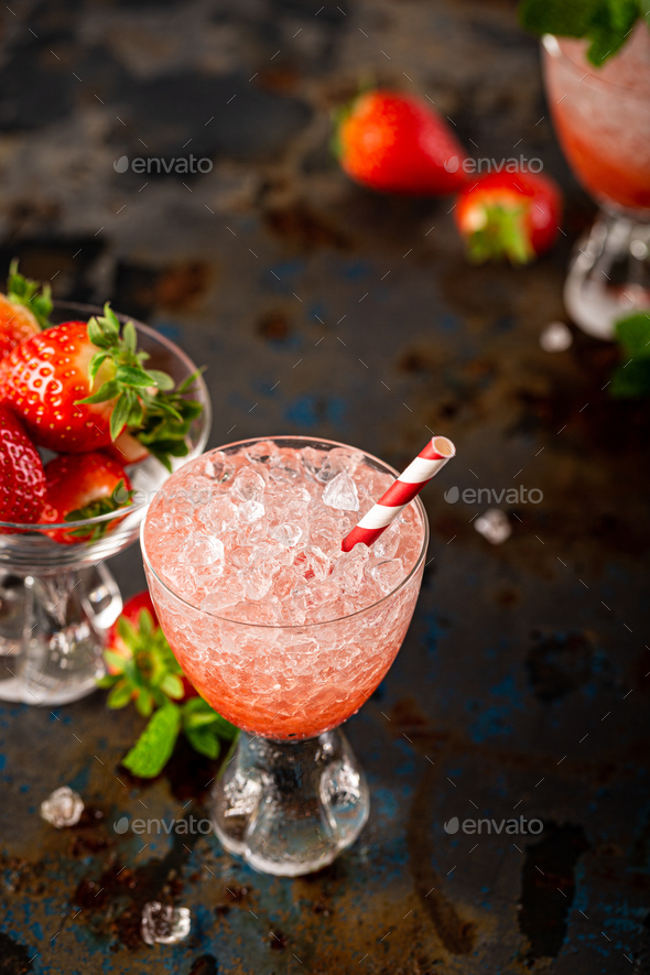 Fresh cocktail with crushed ice, strawberry and mint - Stock Photo - Images