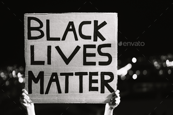 Black lives matter banner - Activist movement protesting against racism and fighting for equality - Stock Photo - Images