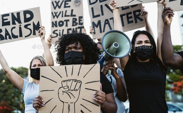 Activist movement protesting against racism and fighting for equality - Stock Photo - Images
