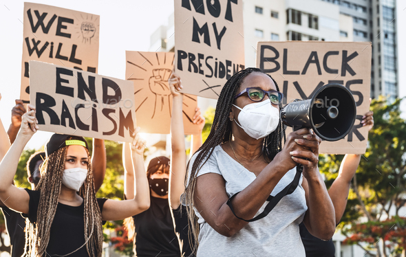 Activist movement protesting against racism and fighting for equality - Stock Photo - Images