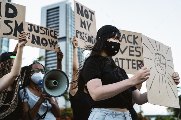 Activist movement protesting against racism and fighting for equality - Stock Photo - Images