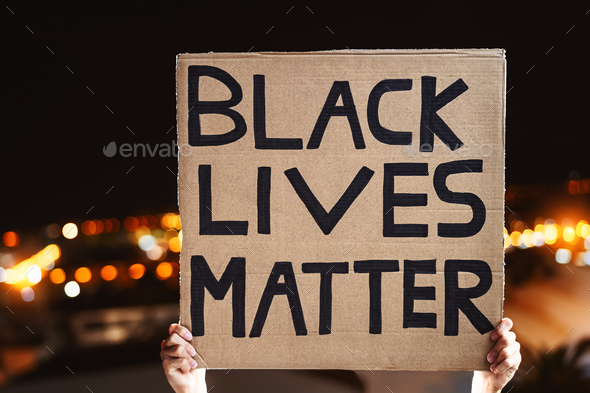 Black lives matter banner - Activist movement protesting against racism and fighting for equality - Stock Photo - Images