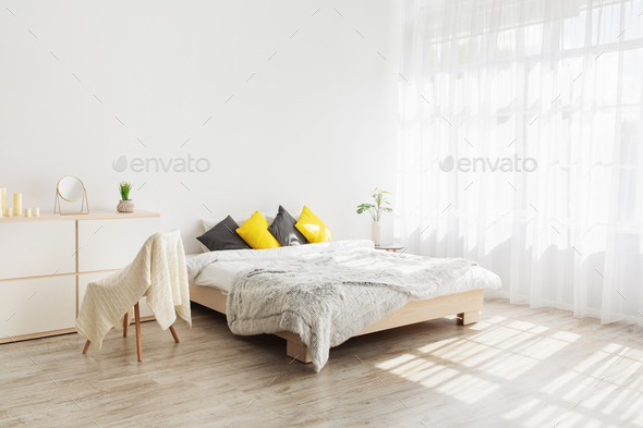 Cozy Feminine Bedroom With Throw Pillows And Plants At White Blank Wall Stock Photo By Prostock Studio