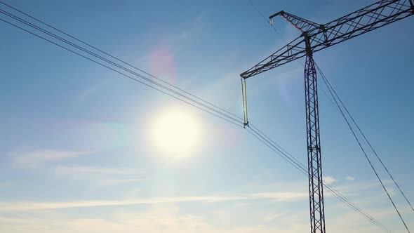 High Voltage Tower with Electric Power Lines Transfening Electrical Energy Through Cable Wires alt