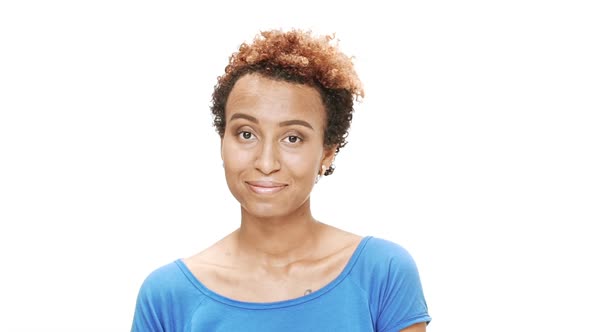 Young Beautiful African Girl Smiling Over White Background alt
