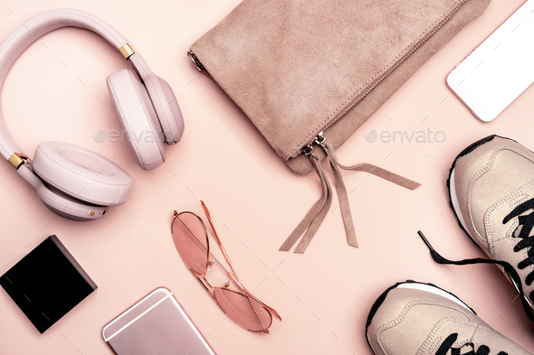 Girls hipster summer nude pink stuff and accessories: bag, sneakers, phone,  headphones Stock Photo by Olga_Kochina