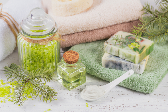 Natural cosmetic oil, sea salt, facial mask and natural handmade soap with coniferous extract - Stock Photo - Images