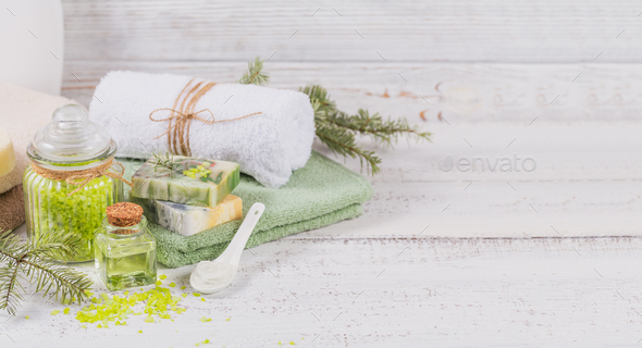 Natural cosmetic oil, sea salt, facial mask and natural handmade soap with coniferous extract - Stock Photo - Images