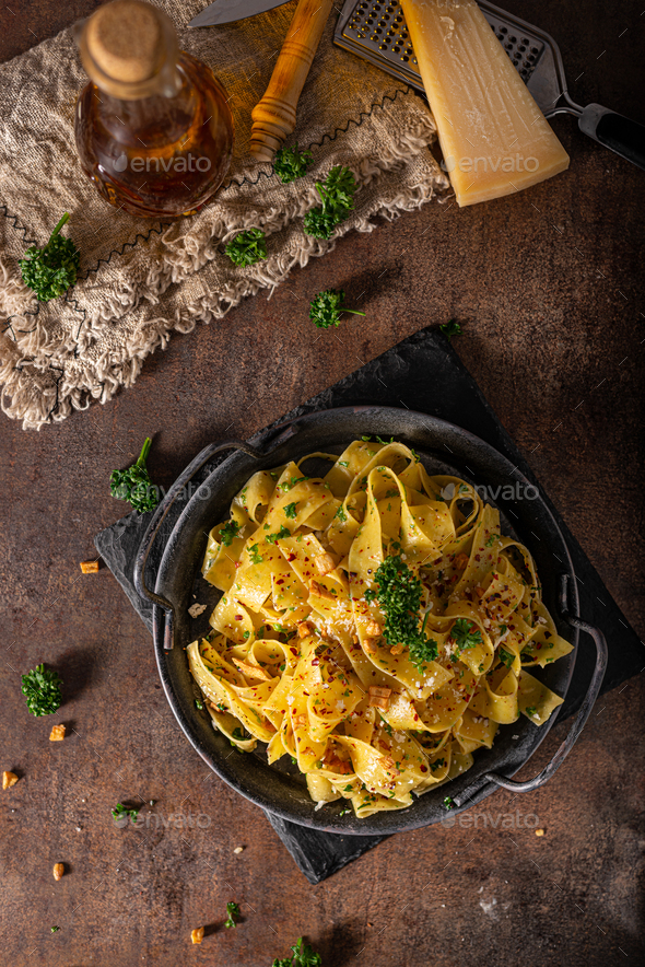 Garlic pasta with chilli flakes Stock Photo by PeteerS PhotoDune