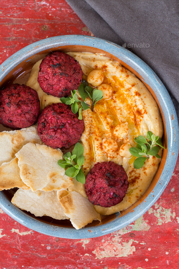 Chickpea hummus, beetroot falafel with paprika, olive oil, pita bread