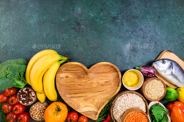 Background healthy food. Fresh fruits, vegetables, meat and fish on table. Eating for healthy heart