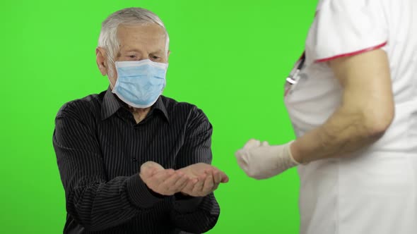 Elderly Man Show Page with Message. Doctor Give Pills. Coronavirus alt