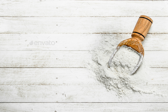 Scoop with flour. - Stock Photo - Images
