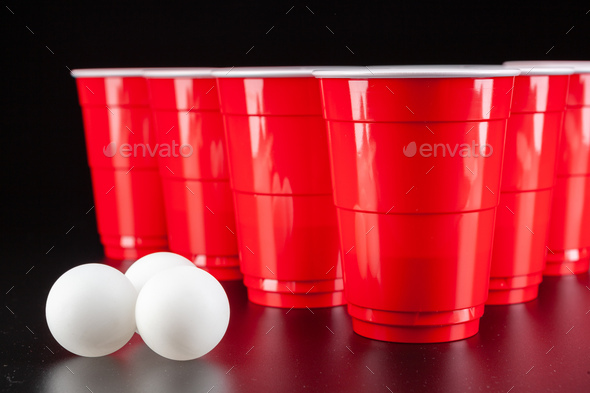 The arrangement of red plastic cups for game of beer pong Stock