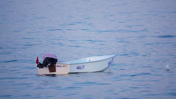 Motor Boat Swaying Through the Waves alt