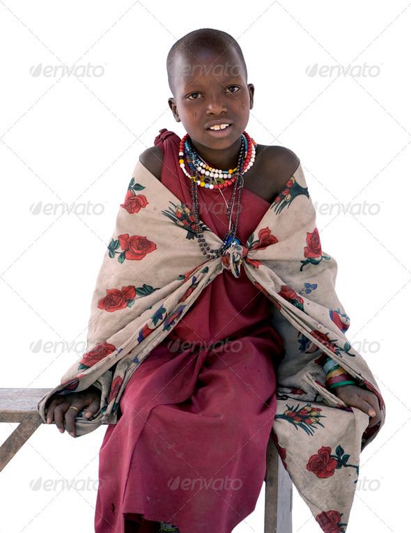 Portrait of a masai child looking at the camera - Stock Photo - Images
