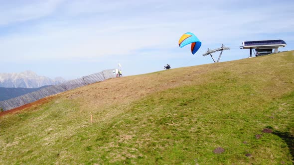 Paragliders Flying Over The Schmittenhohe Mountain In Salzburg, Austria. aerial alt