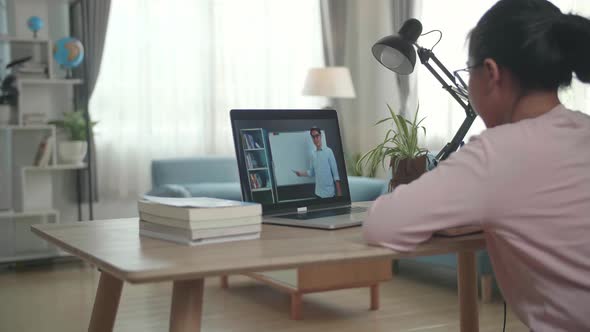 Teen Girl Student Distance Learning With Online Teacher On Computer Screen. Web Tutor alt