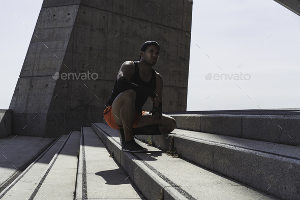 Muscular Fit Sport Model Sprinter Resting After His Workout Stock Photo By Eyecan