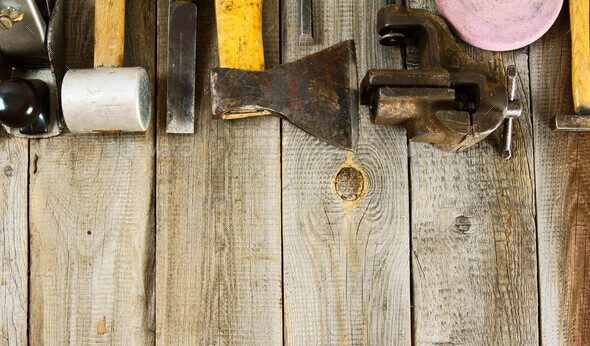 Many working tools on a wooden background. - Stock Photo - Images
