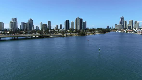 Stunning Surfers Paradise from the air, Descending shot ending with tree and foreshore. alt