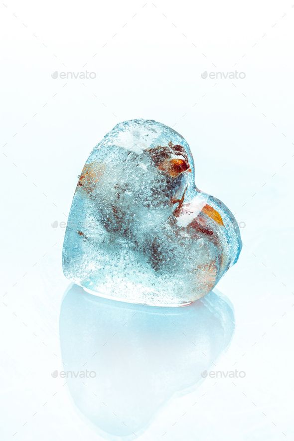 Square melting ice cubes on wet table Stock Photo by FabrikaPhoto