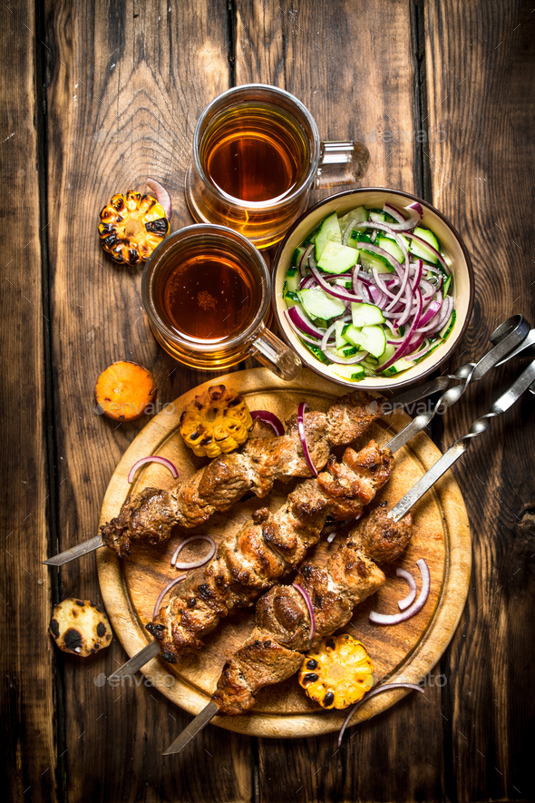 Pork kebab with beer and vegetables. Stock Photo by Artem_ka | PhotoDune