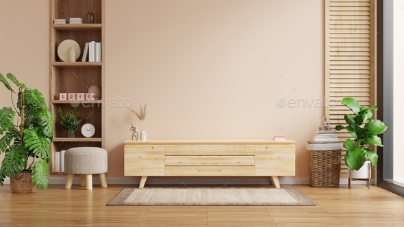 Modern interior of living room with cabinet for tv on cream color wall  background. Stock Photo by vanitjan