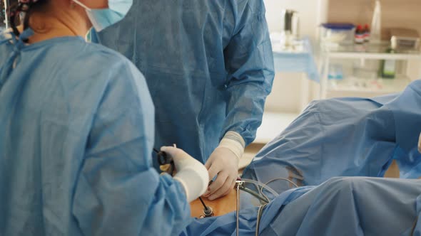 Laparoscopic Instruments in Action During Abdomen Surgery alt