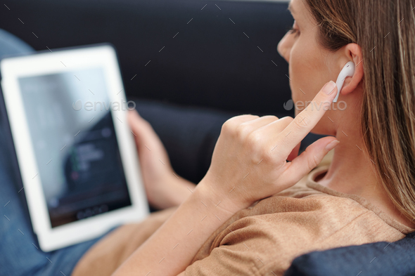 Woman Setting Music Volume - Stock Photo - Images