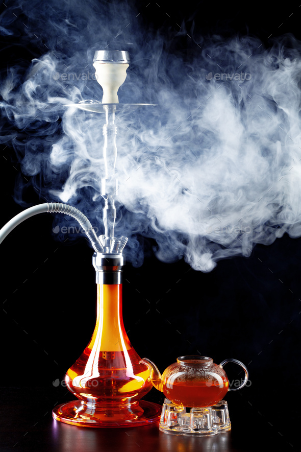 Modern shisha and glass teapot on black background Stock Photo by  FabrikaPhoto