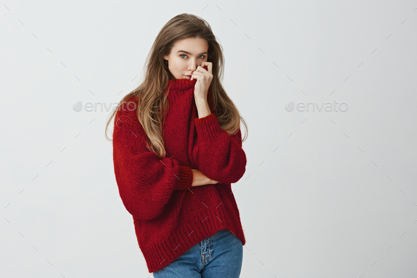 Girl hugged boyfriend and smells his perfume on her sweater. Portrait of sensual good-looking
