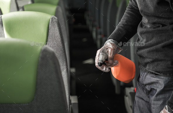 Bus Driver Cleaning and Disinfecting Seats
