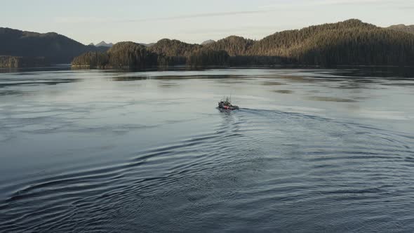 Aerial view of a commercial fishing boat in the Inside Passage, Alaska, USA alt