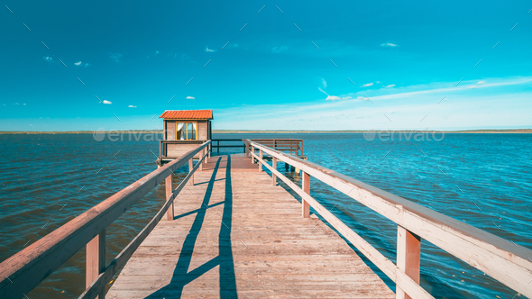 Wooden Pier For Fishing, Small House Shed And Beautiful Lake Or