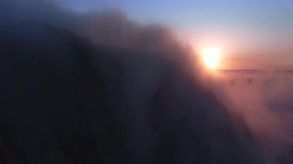 Cinematic Pink and Purple Fluffy Clouds Moving Softly on Sky at Golden Sunset alt