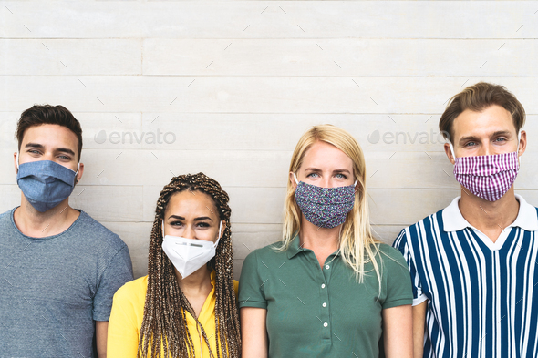 Multiracial friends wearing face mask for preventing and stop corona virus spread