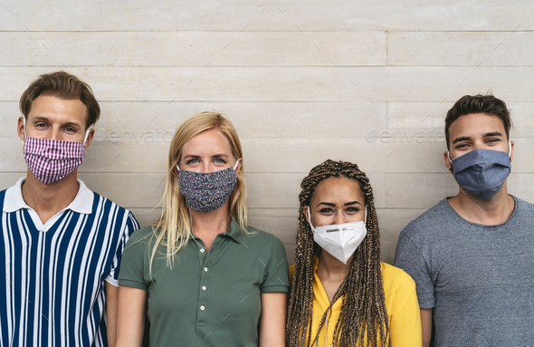 Friends wearing face protective mask to avoid corona virus spread