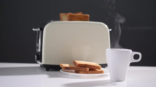 Cup Of Hot Coffee. Coffee Or Tea. white Cup Of Hot Beverage With Steam. toast with ready fried toast