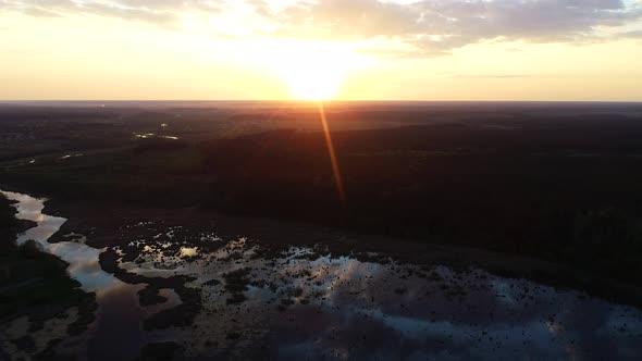 Beautiful Sunset Above Wild Swamp and Forest