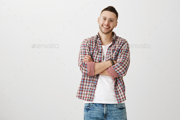 What funny person you are. Indoor portrait of good-looking mature male student with bristle in