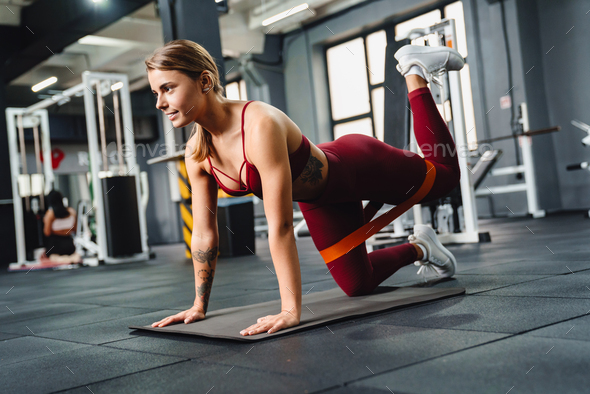 Positive young woman fitness coach making sport exercise Stock Photo by ...