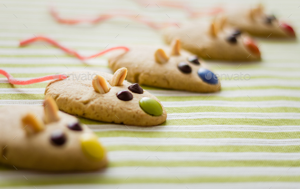 Cookies with mouse shaped and red licorice tail