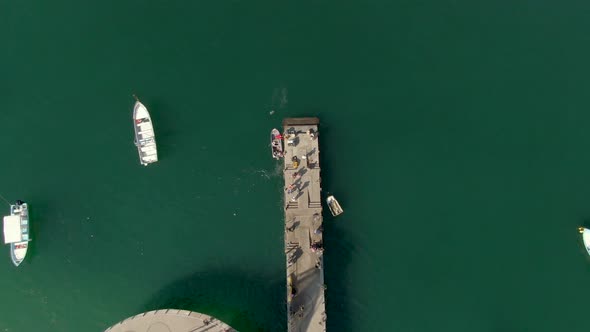 Top down view Of Los Muertos Pier, Puerto Vallarta, Jalisco, Mexico - drone shot alt
