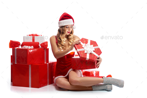 Premium Photo  Adult woman opening christmas gifts